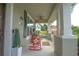 Inviting front porch with rocking chairs and decorative accents, offering a relaxing outdoor space at 888 Wakulla Ln, Winter Springs, FL 32708