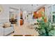 Bright kitchen featuring stainless appliances, wood cabinetry, and a breakfast bar with granite countertops at 888 Wakulla Ln, Winter Springs, FL 32708
