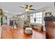 Inviting loft with wood floors, lots of natural light, and a decorative fireplace at 888 Wakulla Ln, Winter Springs, FL 32708