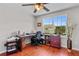 Bright office featuring wood floors, a ceiling fan, a window with a view, and desk at 888 Wakulla Ln, Winter Springs, FL 32708