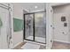 Modern bathroom featuring a tiled shower with glass enclosure, and neutral-colored walls at 888 Wakulla Ln, Winter Springs, FL 32708
