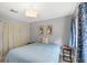 A serene bedroom with calming tones and natural light at 942 Beach Breeze Dr, Orlando, FL 32835