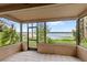 Screened patio offers stunning lake views and provides a seamless transition to the outdoors at 942 Beach Breeze Dr, Orlando, FL 32835