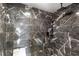Luxurious shower featuring contemporary fixtures and floor-to-ceiling tile surround at 942 Beach Breeze Dr, Orlando, FL 32835