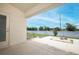 The back patio is covered and leads to a yard with a fire pit at 1061 Citrus Landings Blvd, Davenport, FL 33837