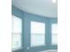 Brightly lit bedroom with multiple windows at 1061 Citrus Landings Blvd, Davenport, FL 33837