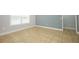 Another view of the spacious living room with tile floors, neutral walls, and natural light from windows at 1061 Citrus Landings Blvd, Davenport, FL 33837