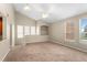 Spacious living room with large windows providing ample natural light at 1101 Vintage Village Ln # 101, Ocoee, FL 34761