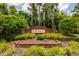 Community entrance sign for Bordeaux surrounded by lush landscaping at 1101 Vintage Village Ln # 101, Ocoee, FL 34761