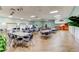 Large event space featuring a bar, tables, and chairs, ideal for gatherings and celebrations at 1110 Woodbine Street, Fern Park, FL 32730