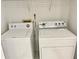 Laundry room featuring a standard washer and dryer at 1110 Woodbine Street, Fern Park, FL 32730