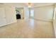 Bright main bedroom with tile floors, a ceiling fan, and natural light from a window at 1110 Woodbine Street, Fern Park, FL 32730