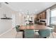 Spacious kitchen with modern appliances, a center island, and a dining area perfect for entertaining at 11429 Nona Sound St, Orlando, FL 32832