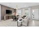 Inviting living room featuring contemporary furnishings, stylish accents, and a comfortable seating area at 11429 Nona Sound St, Orlando, FL 32832