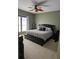 Comfortable bedroom features a large bed, ample natural light, and a relaxing atmosphere at 1200 Ironsmith Dr # 508, Celebration, FL 34747