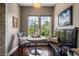 Charming breakfast nook with a table, chairs, bench seating, and bright natural light from the windows at 1200 Ironsmith Dr # 508, Celebration, FL 34747