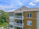 Exterior of a home featuring multiple private balconies and a neutral color palette at 1200 Ironsmith Dr # 508, Celebration, FL 34747
