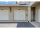 Attached garage offering convenience and secure parking, with extra storage space and easy access to the home at 1200 Ironsmith Dr # 508, Celebration, FL 34747