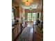 Well-appointed kitchen with granite countertops, modern appliances, and a cozy breakfast nook at 1200 Ironsmith Dr # 508, Celebration, FL 34747