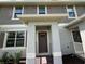 Charming home front entrance, featuring a brick walkway and a covered entryway at 12035 Holystone St, Winter Garden, FL 34787