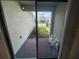 View from a slider to the back patio, pavers and lawn at 12035 Holystone St, Winter Garden, FL 34787