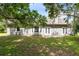 View of the backyard and rear exterior of the home at 13018 S Sunset Ter, Winter Garden, FL 34787