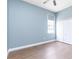 Bedroom featuring clean laminated floors, neutral paint, a ceiling fan, and natural light at 13018 S Sunset Ter, Winter Garden, FL 34787