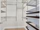 Walk-in closet with custom shelving, providing ample storage space at 13018 S Sunset Ter, Winter Garden, FL 34787