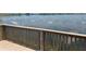 Lush pond scenery highlighting peaceful waters and a wooden barrier overlooking the lake at 1345 Griffon Ave, Lake Alfred, FL 33850