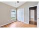 Well-lit bedroom with wood laminate floors and a closet at 139 Andrews Rd, Sanford, FL 32773
