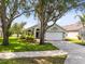 Charming single-Gathering home with manicured landscaping and a two-car garage at 139 Andrews Rd, Sanford, FL 32773