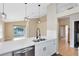 Living space showcasing breakfast bar and view of a lake at 139 Andrews Rd, Sanford, FL 32773