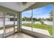 Enjoy relaxing lake views from this screened patio with a ceiling fan at 139 Andrews Rd, Sanford, FL 32773