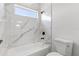 Bathroom featuring a tub, shower, and marble tiling at 14915 Sw 39Th Cir, Ocala, FL 34473