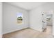 Bright bedroom featuring natural light, and interior door at 14915 Sw 39Th Cir, Ocala, FL 34473
