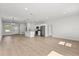 Open-concept living area with kitchen, dining, and living spaces flowing seamlessly with modern finishes at 14915 Sw 39Th Cir, Ocala, FL 34473