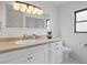 Bright bathroom with vanity and decorative lighting fixture and lots of light at 1514 Sparrow St, Longwood, FL 32750