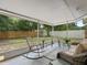 Enjoy outdoor living on this covered patio overlooking a spacious, fenced backyard at 1514 Sparrow St, Longwood, FL 32750
