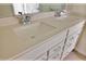 Bathroom featuring double sinks and modern fixtures at 16129 Palm Frond Ave, Clermont, FL 34714