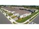 Aerial view of homes in a residential neighborhood with lush landscaping and community amenities at 1650 Key Bay Trl, Kissimmee, FL 34747
