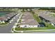 Aerial view of a residential community featuring well-maintained homes, landscaping, and a community pool at 1650 Key Bay Trl, Kissimmee, FL 34747