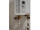 Close-up view of the hot water heater at 2035 Voltaire St, Lakeland, FL 33801