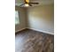 A spacious bedroom offering appealing floor finishes and a ceiling fan for added comfort at 2085 San Jose Blvd, Orlando, FL 32808