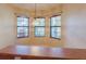 Bright breakfast nook features multiple windows, allowing for ample natural light at 223 Monterey St, Kissimmee, FL 34759