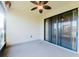 Screened lanai with ceiling fan at 223 Monterey St, Kissimmee, FL 34759