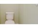 Close-up of a standard white toilet in a light green bathroom setting at 223 Monterey St, Kissimmee, FL 34759