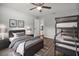 Stylish bedroom features a bed, a bunk bed, and modern decor, creating a cozy and functional space at 229 Marcum Trace Dr, Lakeland, FL 33809