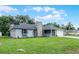 Charming single Gathering home with stone accents and a well-maintained lawn and two car garage at 229 Marcum Trace Dr, Lakeland, FL 33809