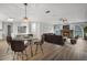 The large open concept living space includes a dining area and a fireplace at 229 Marcum Trace Dr, Lakeland, FL 33809