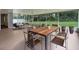 Spacious screened patio includes dining and lounge areas perfect for enjoying the outdoors at 229 Marcum Trace Dr, Lakeland, FL 33809